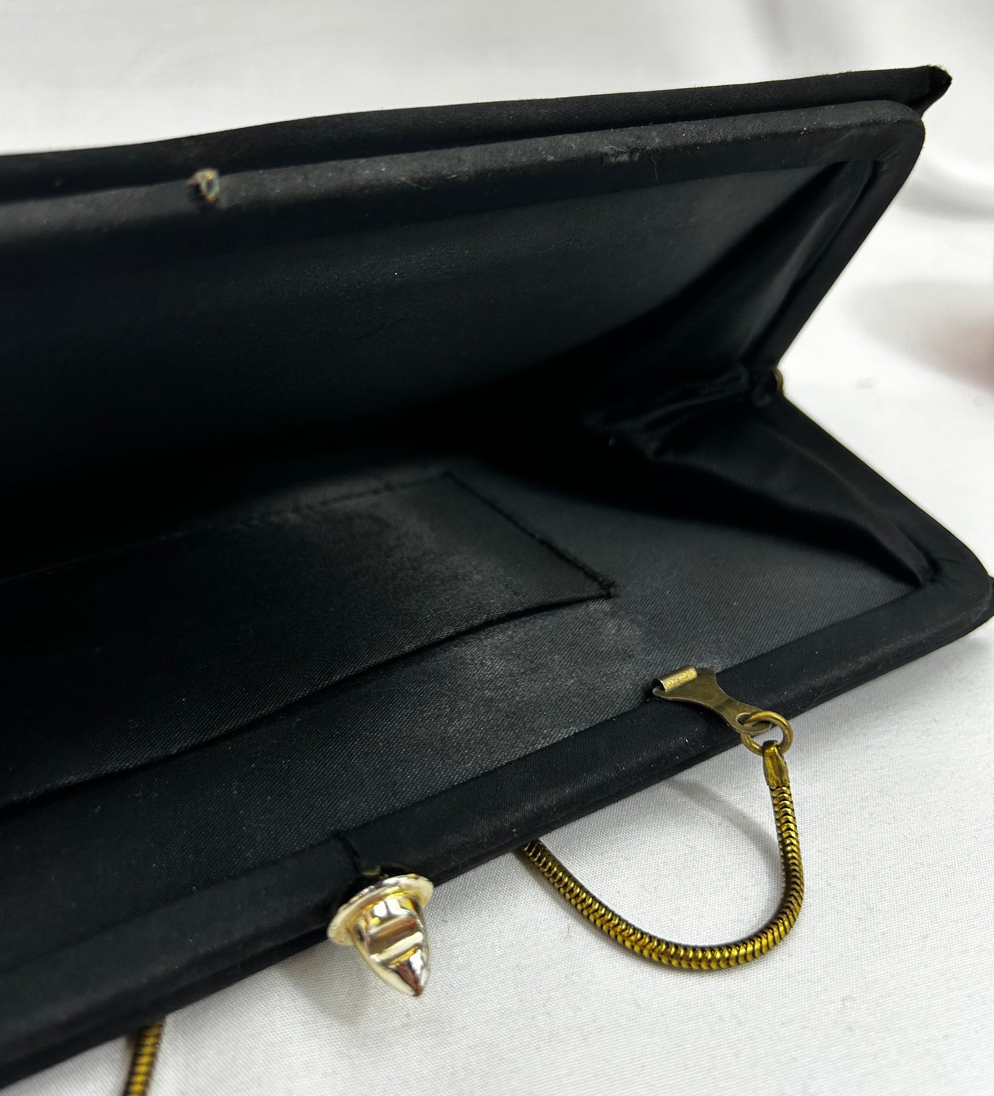 Black fabric clutch with bow