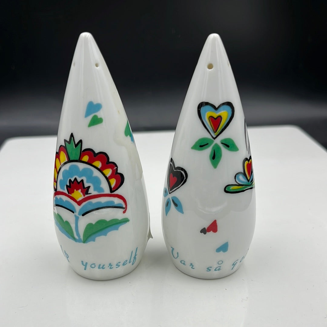 White cone shaped salt and pepper shakers
