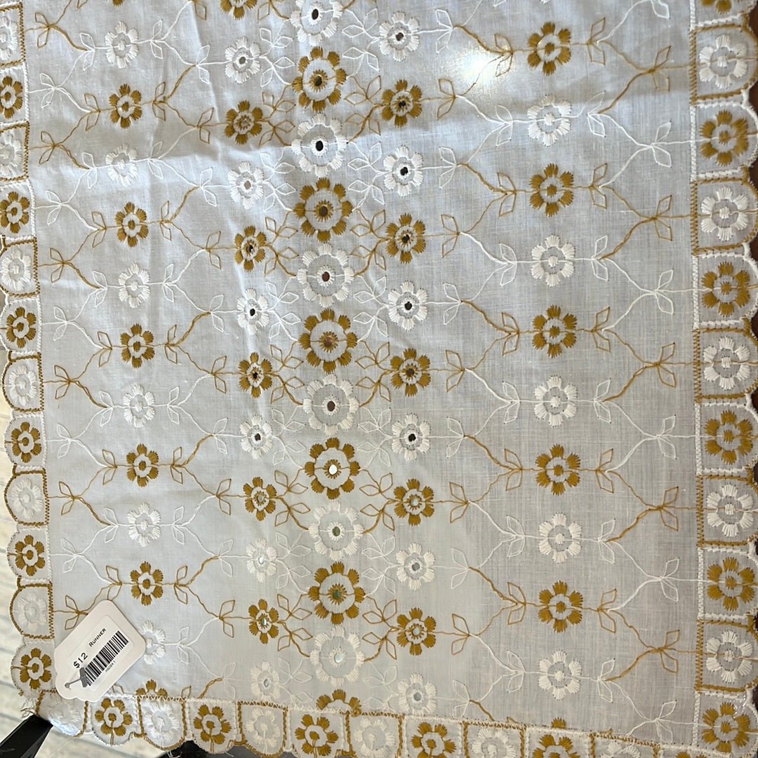 Embroidered eyelet table runner