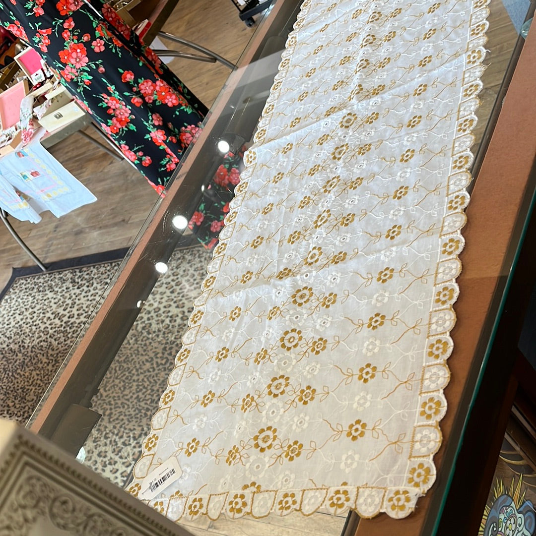 Embroidered eyelet table runner