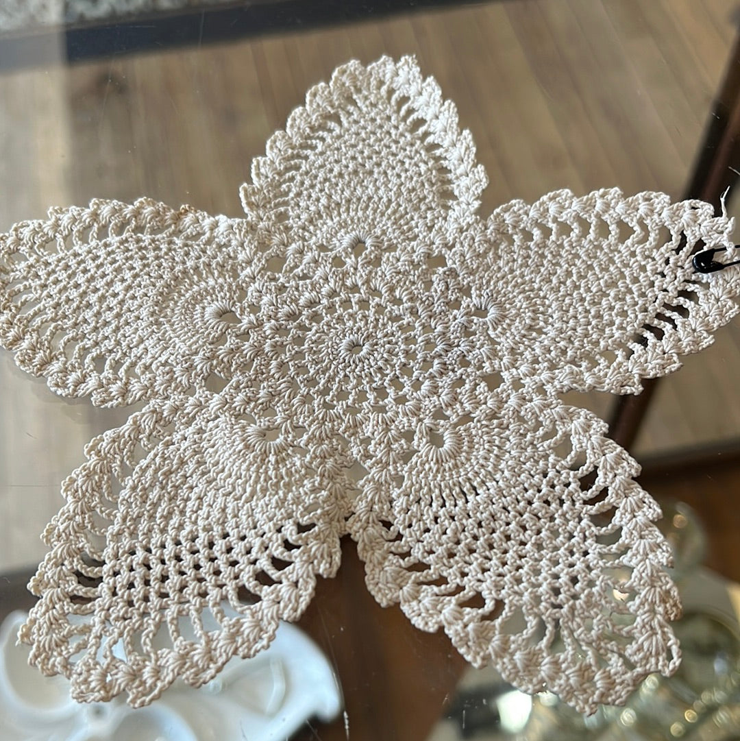 Star shaped ivory crocheted doilies