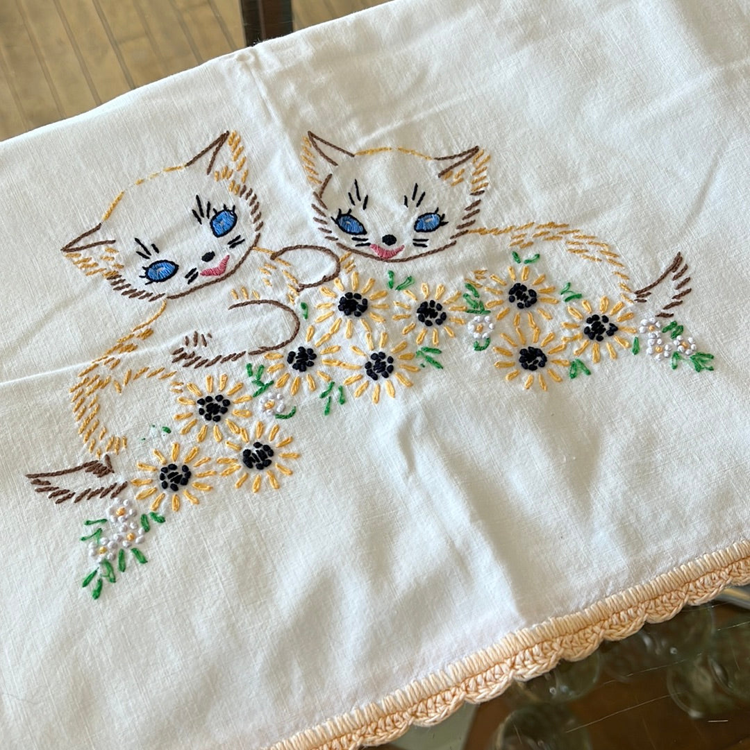 Embroidered kitten pillowcase