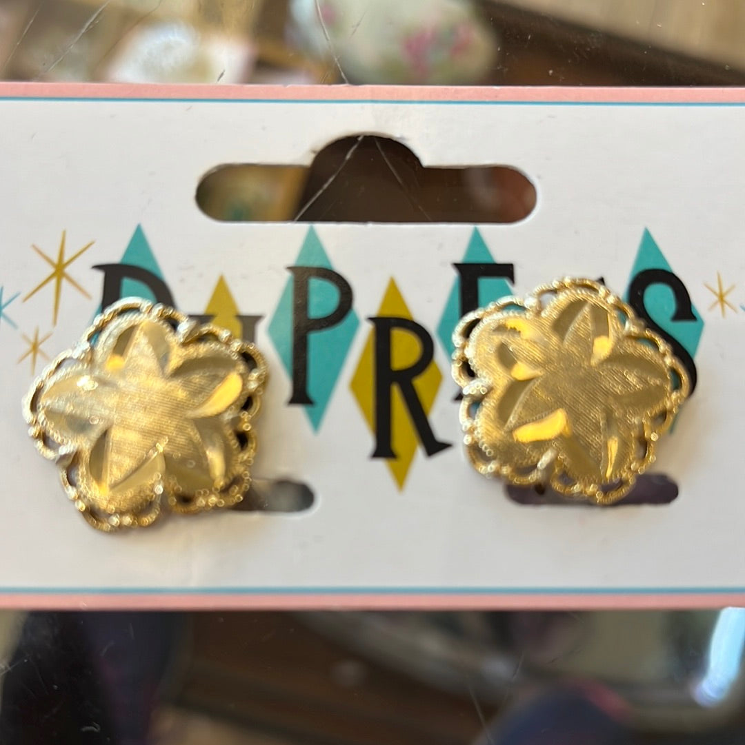 Gold flower clip on earring