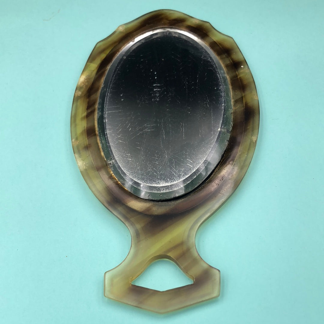 Oval hand mirror