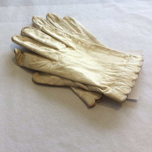 White leather gloves