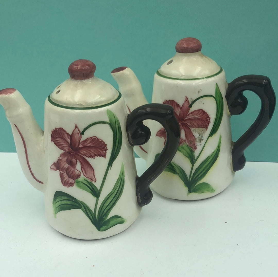 White tall teapot with floral design salt and pepper shaker