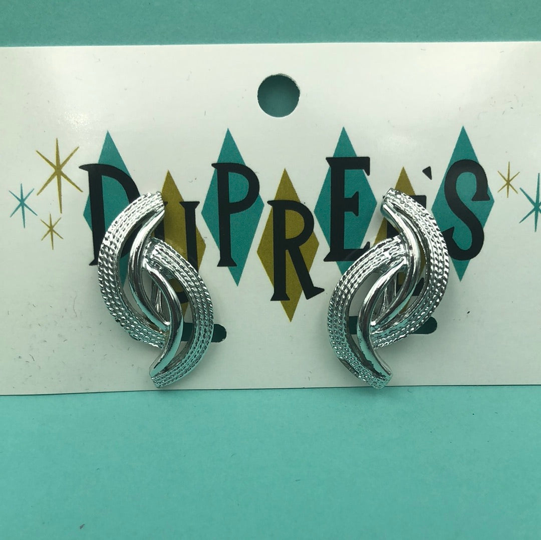 Silver crescent shape clip on earrings