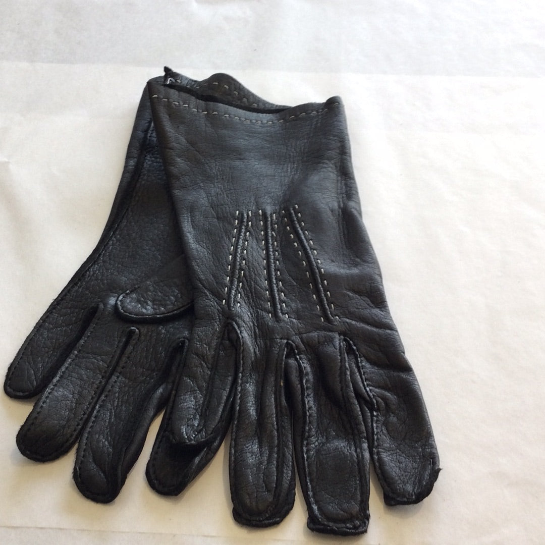Black leather gloves with white stitching