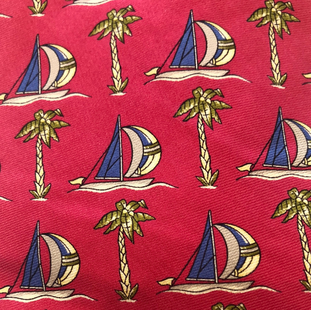 Red tie with sailboats and palm trees