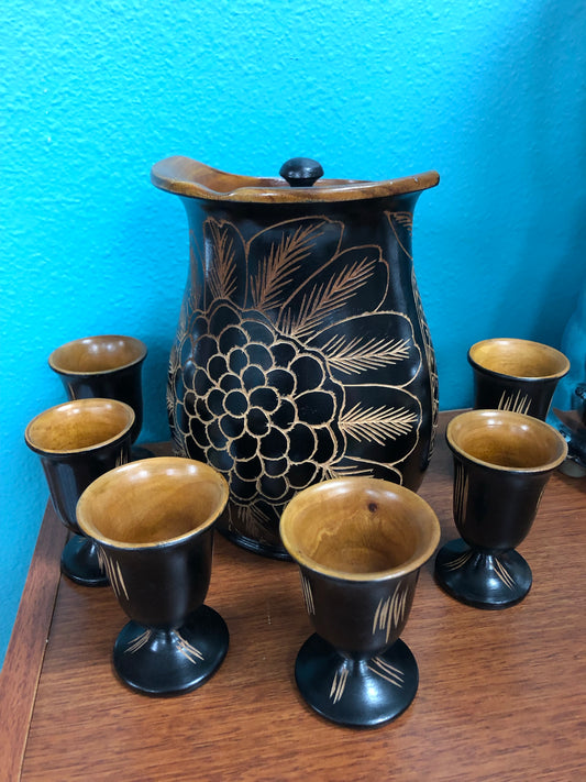 Hand carved wood pitcher and 6 hand carved matching cups