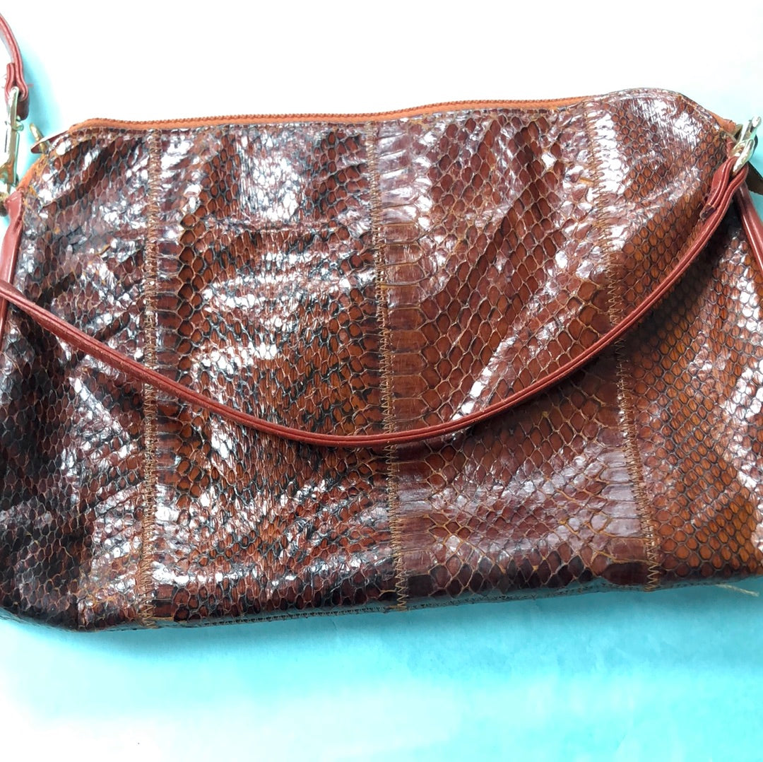 Brown snake skin pattern purse with leather handle