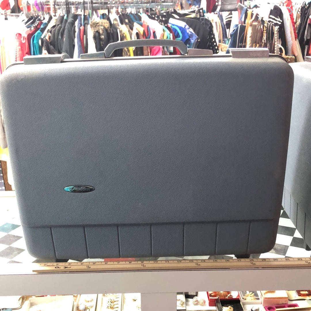 Medium blue hard side suitcase