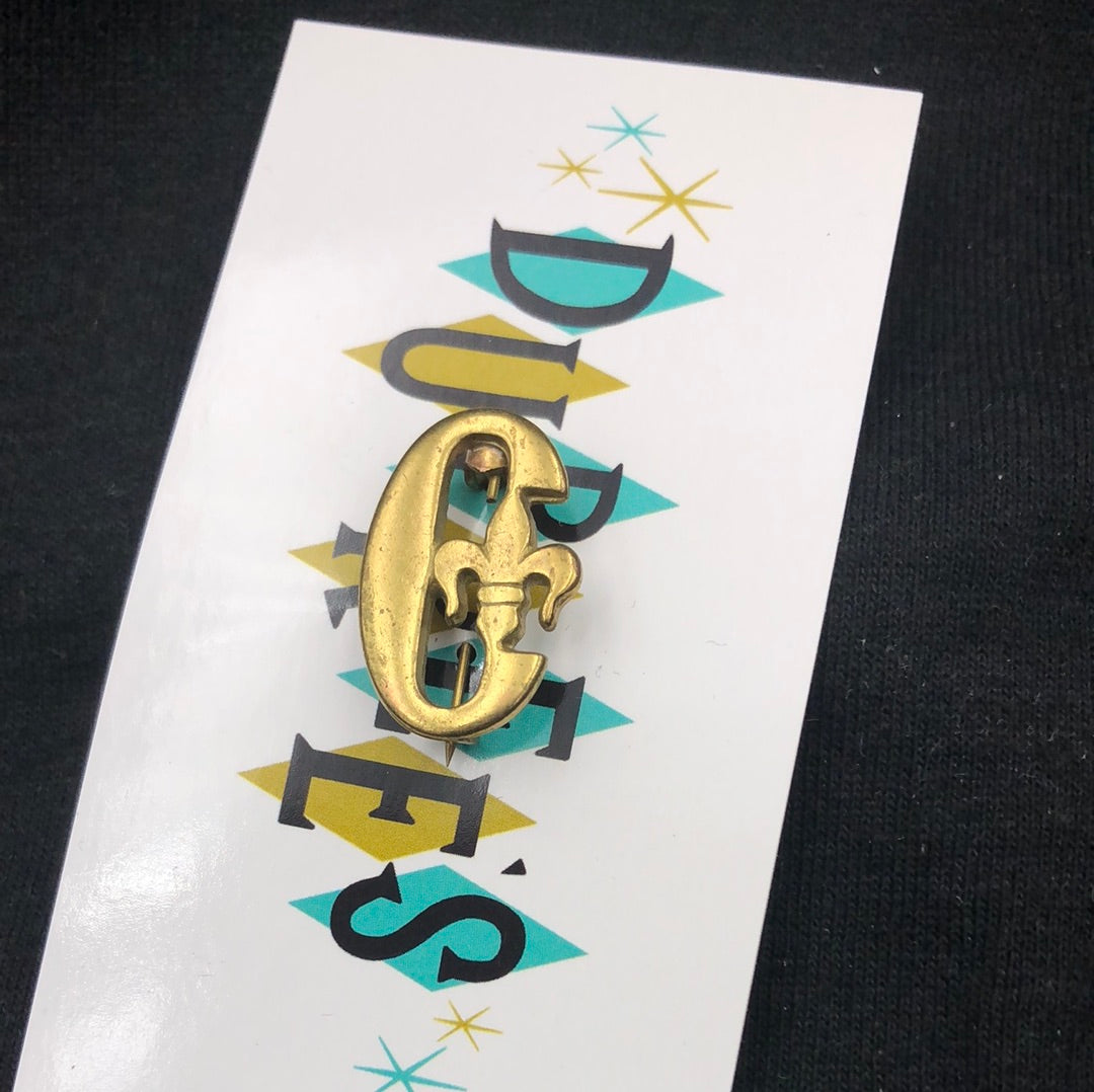 Gold letter C pin with fleur de lis