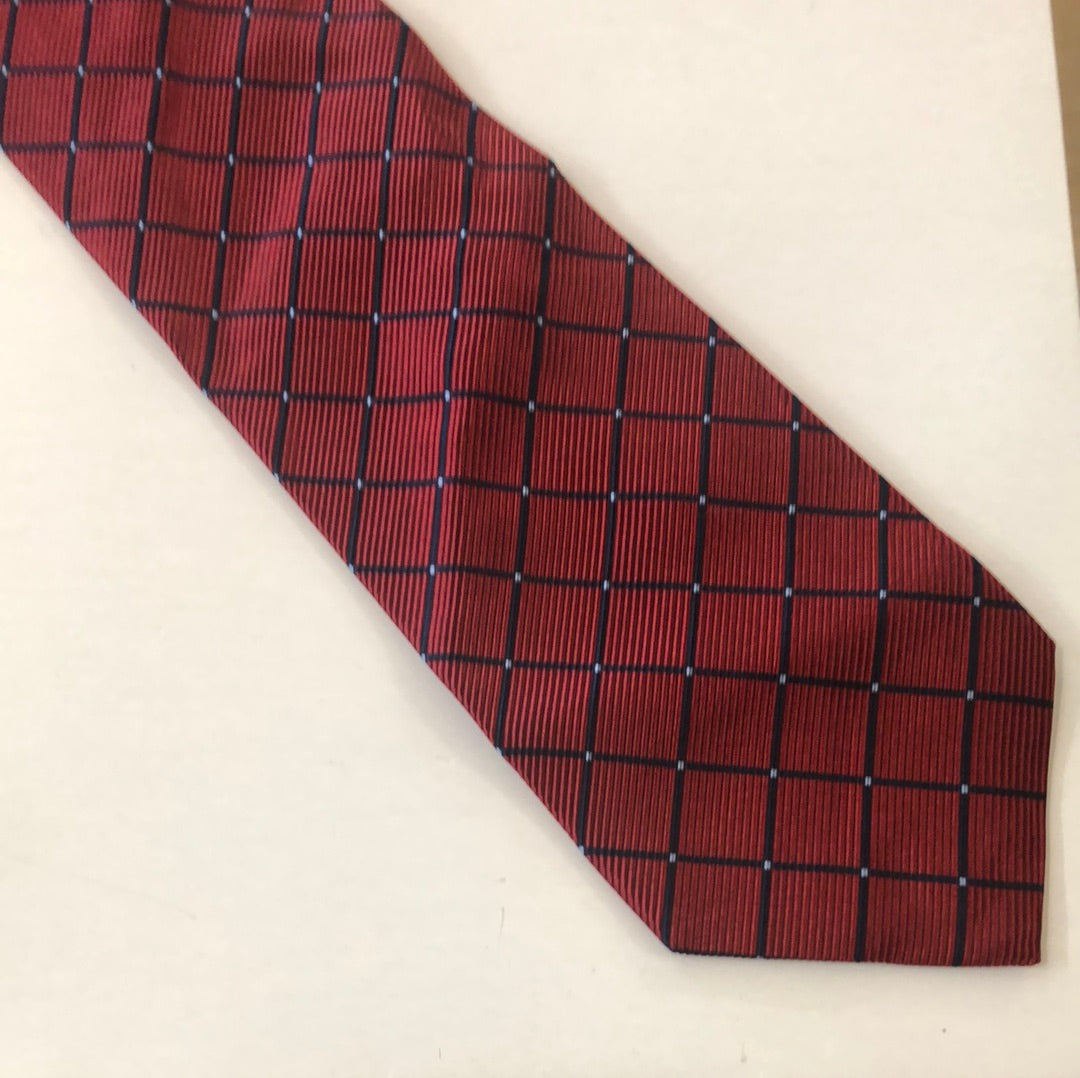 Red tie with diagonal diamond pattern
