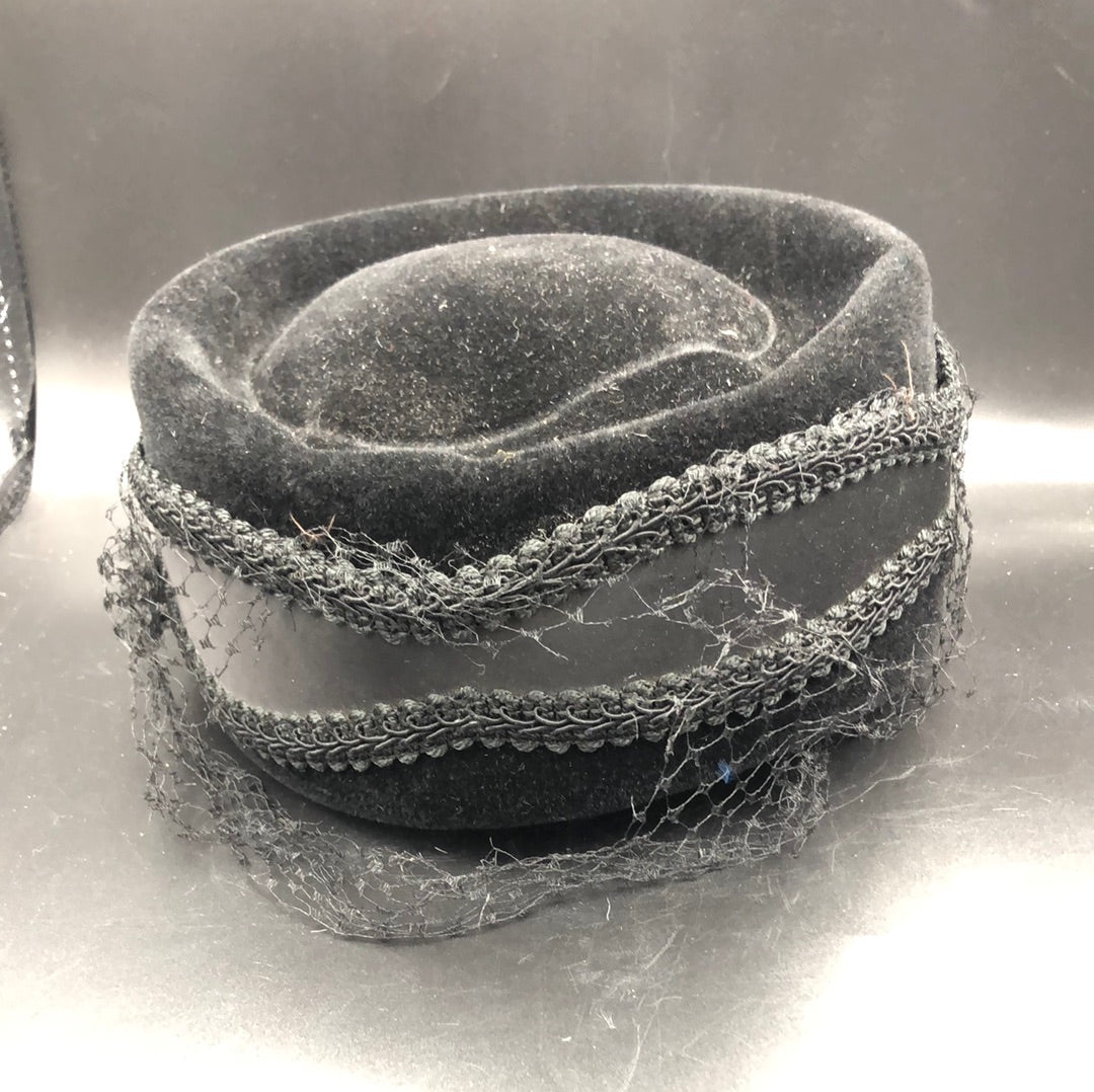 Black velvet hat with brim detail and black net