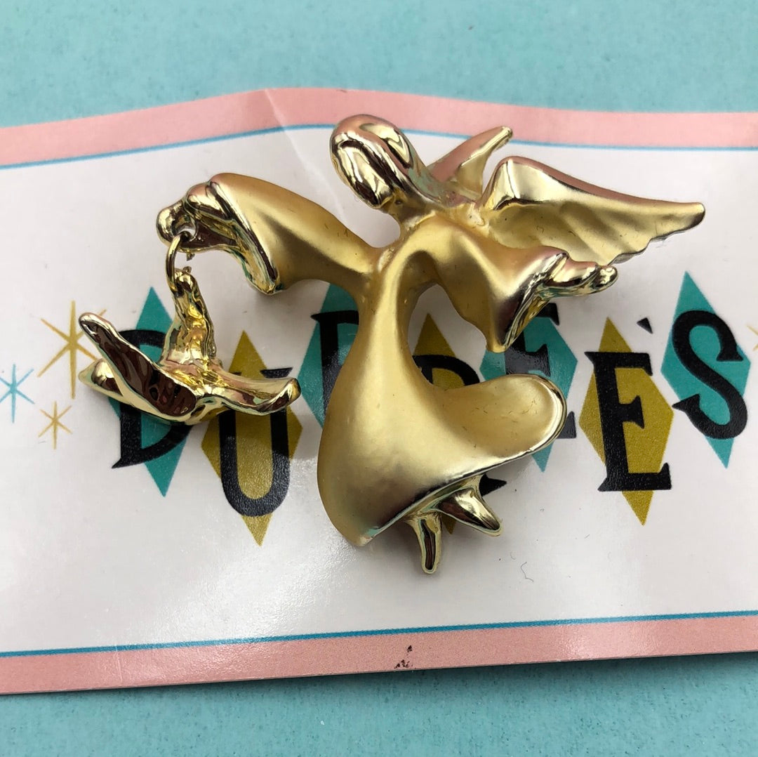 Gold angel and bird pin