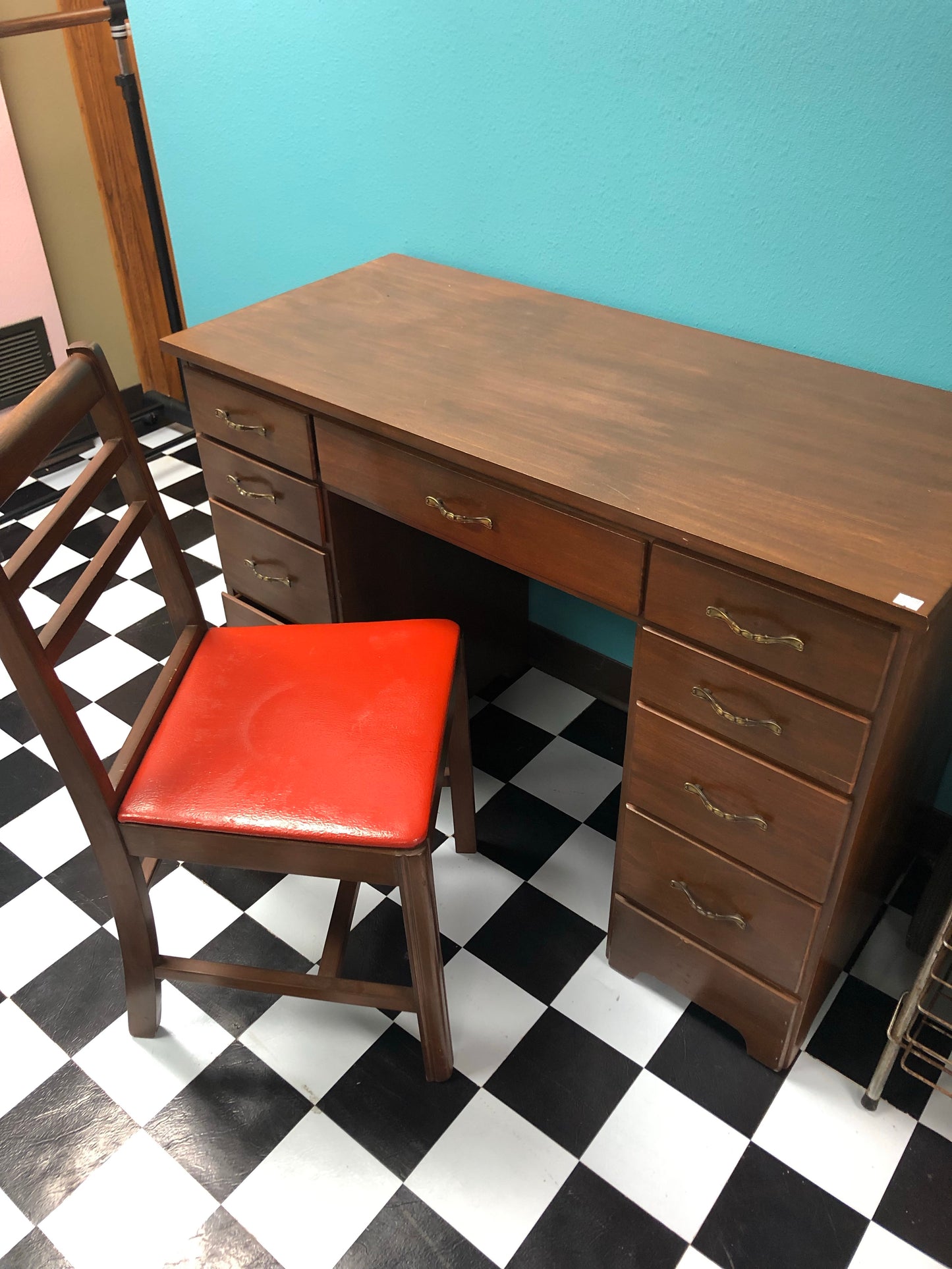 Wooden 8 drawer desk and chair with orange seat