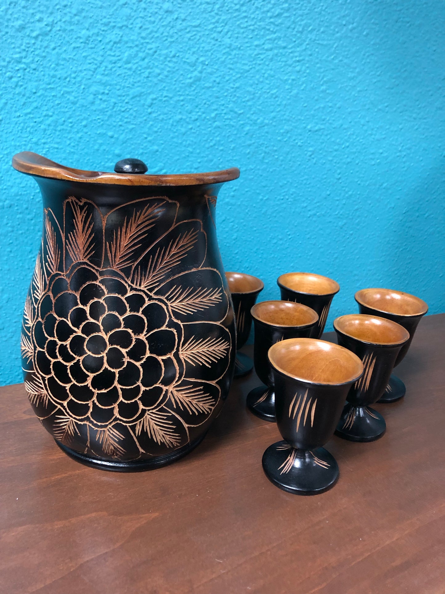 Hand carved wood pitcher and 6 hand carved matching cups