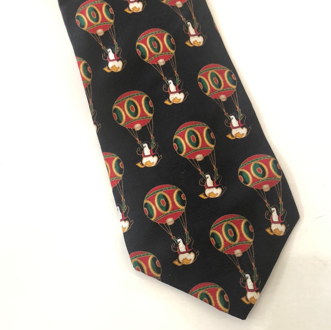 Black tie with penguin and hot air balloon pattern
