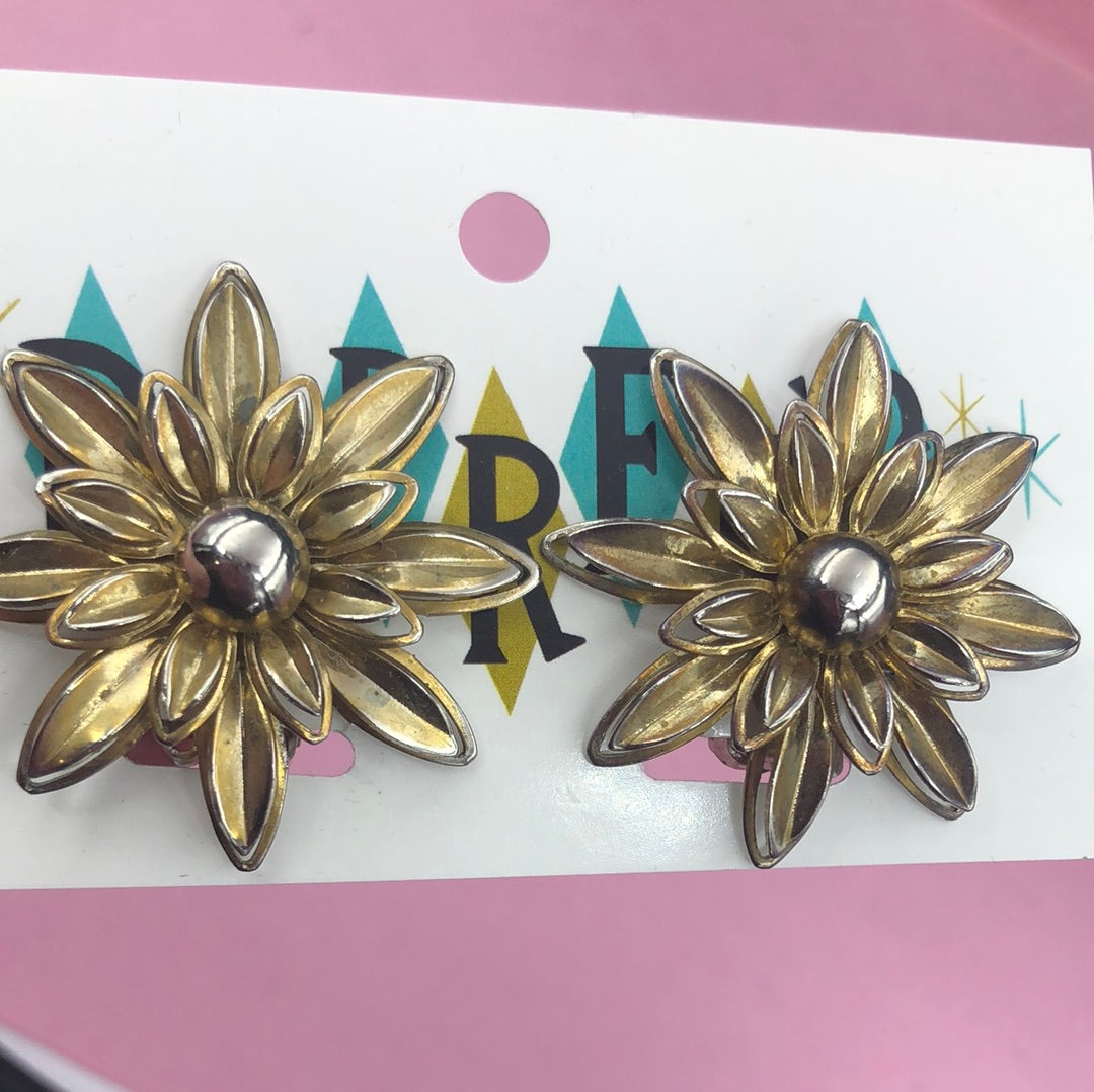 Gold flower clip on earrings