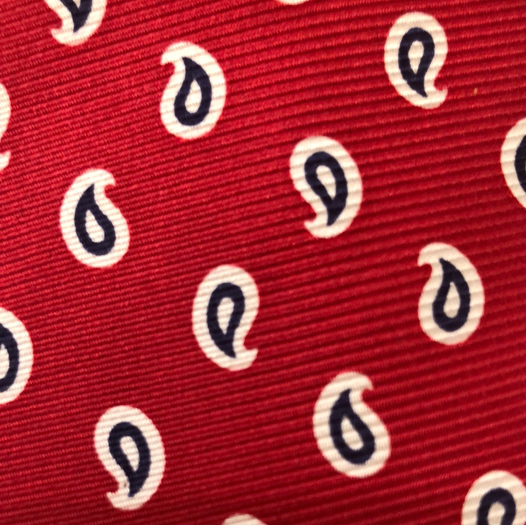 Red tie with blue and white paisley