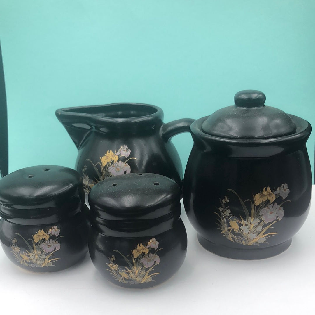 Black ceramic sugar bowl , creamer, and matching salt and pepper shakers
