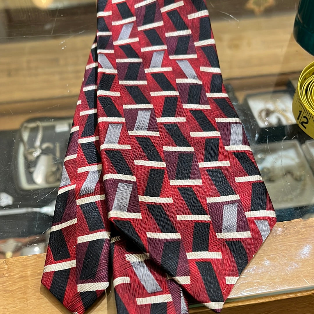 Maroon tie with black and grey graphic design