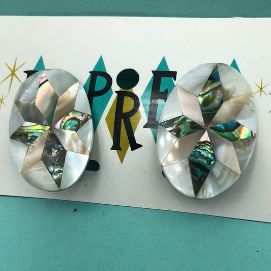 Oval earrings with a quilt star pattern