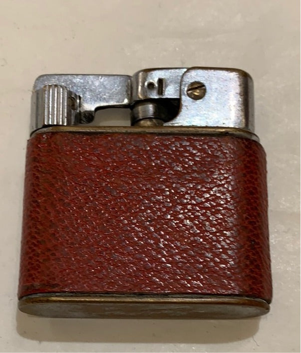 Leather wrapped Myllam swing top lighter